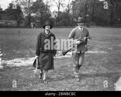 Ladies V Men at the all weather golf club , Kensington Miss Audrey Croft and Major Kennedy Stock Photo