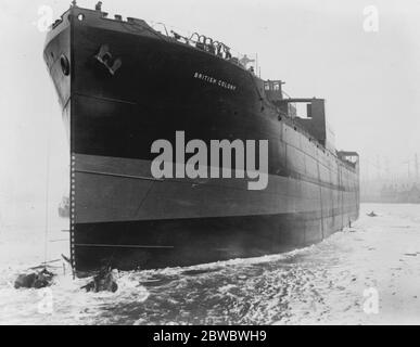Mrs Amery lauches new steamer ,  British Colony  , at Newcastle on Tyne . The vessel , which can carry over 10,000 tons , after the launch . 5 April 1927 Stock Photo