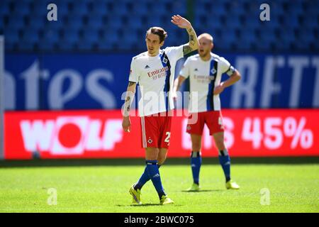 Karlsruhe, Germany. 31st May, 2020. Football 2nd Bundesliga, 29th matchday, Hamburger SV - SV Wehen Wiesbaden in the Volksparkstadion. Adrian Fein from Hamburger SV gestures on the pitch. Credit: Stuart Franklin/Getty Images Europe/Pool/dpa - IMPORTANT NOTE: In accordance with the regulations of the DFL Deutsche Fußball Liga and the DFB Deutscher Fußball-Bund, it is prohibited to exploit or have exploited in the stadium and/or from the game taken photographs in the form of sequence images and/or video-like photo series./dpa/Alamy Live News Stock Photo