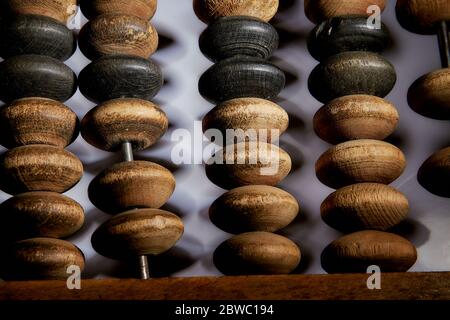old wooden scores close-up on a white background Stock Photo