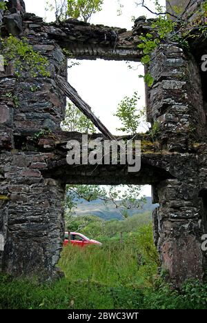 An old and overgrown remains of a castle, Ireland Stock Photo