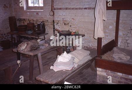 This early 21st century photo shows the interior of slave quarters at Mt. Vernon. At the time of George Washington's death in 1799, African-Americans made up roughly 90% of the plantation's population, with 317 slaves and roughly twenty to thirty Anglo-Americans living on the five farms comprising Mount Vernon. The largest village was at the Mansion House Farm, where around ninety slaves resided. Stock Photo