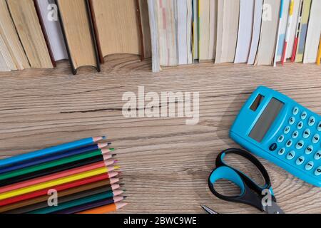 New school supplies. Books arranged in a row. Equipment for every school student. Stock Photo