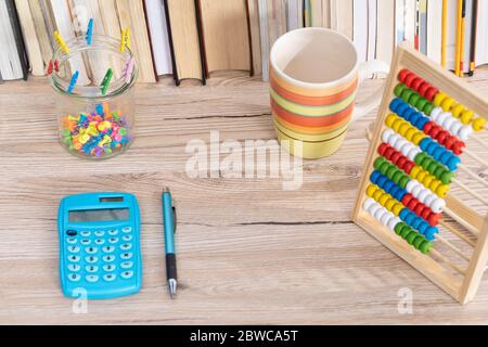 Traditional abacus for children. Electronic calculator for quick counting. Stock Photo