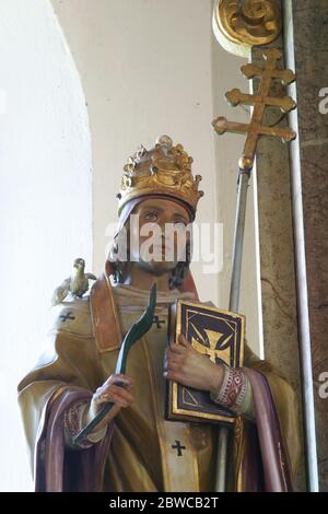 Saint Ambrose statue on the high altar in the Holy Spirit Chapel in Vrtace, Croatia Stock Photo