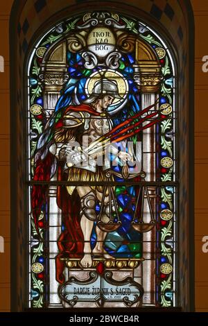 Saint Michael the Archangel, stained glass window in the parish church of the Assumption of the Virgin Mary in Oroslavlje, Croatia Stock Photo