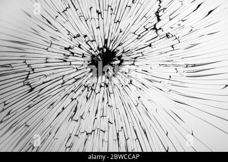 Cracked broken glass, cracked glass on white background, concept for design. Stock Photo