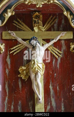 Crucifix at the tabernacle, main altar in the parish church of Helena in Zabok, Croatia Stock Photo