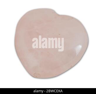 Polished heart shaped rose quartz mineral gem stone isolated on white background Stock Photo