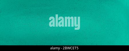 Turquoise painted wall texture. Panoramic turquoise wall background Stock Photo