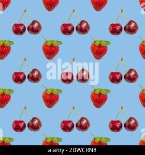 Seamless pattern of fresh ripe strawberry and cherry on light blue background Stock Photo