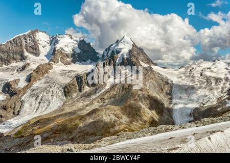 Piz Roseg and Sella Glacier seen from Piz Corvatsch Mountain Station, Grisons, Switzerland Stock Photo