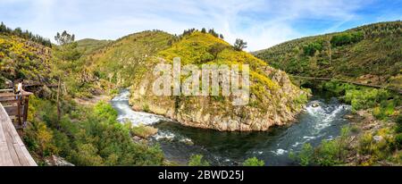 Arouca, Portugal - April 28, 2019: Panoramic landscape of a curved section of the Paiva river, seen from the Paiva walkways. Stock Photo