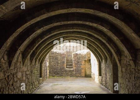 Barrel-Vaulted Basement of Crookston Castle in the Pollock Area in Glasgow, Scotland. Photo Showing Cellar Style Arch Ceiling and Stone Walls. Free En Stock Photo