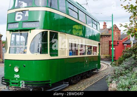 Birkenhead, UK: Oct 1, 2017: A tram carries passengers on the Heritage Tramway to the Woodside Ferry Terminal on the open day of Wirral Transport Muse Stock Photo