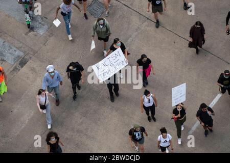 Austin, TX USA May 31, 2020: Protesters ride and march down 12th Street near the Texas Capitol on the second day of rallies against racism and the police killing of George Floyd last week. An official rally was cancelled by organizers but over 2,000 Texans showed up anyway denouncing violence, hatred and police brutality. Credit: Bob Daemmrich/Alamy Live News Stock Photo