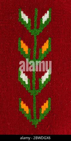 Fragment of Romanian traditional wool carpet design pattern. Stock Photo