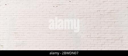 Wide white painted brick panorama backdrop, subtle texture creative copy space, horizontal aspect Stock Photo