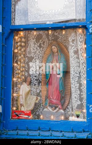 Virgin of Guadalupe in window,Old Town Artisans,El Presidio Historic District,Tucson, Arizona,USA Stock Photo