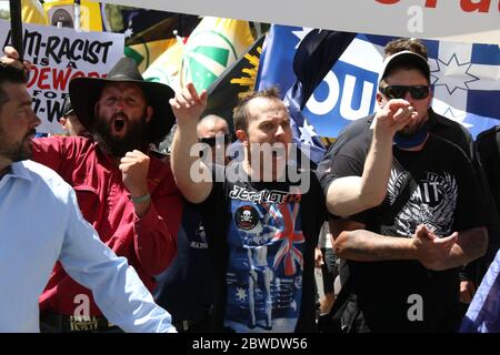 Key activists of Australian patriot groups lead the front of the march to Parliament House, including Farmer John, Shermon Burgess and Neil Erikson. Stock Photo