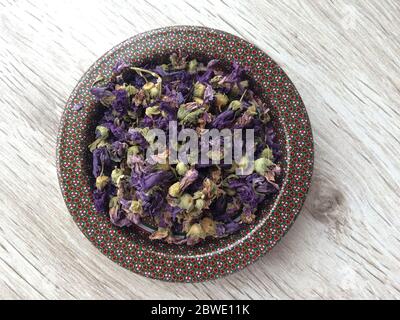 Common mallow flowers, Malvae flos. Cheeses, medicinal. Dried herbal natural tea. Stock Photo