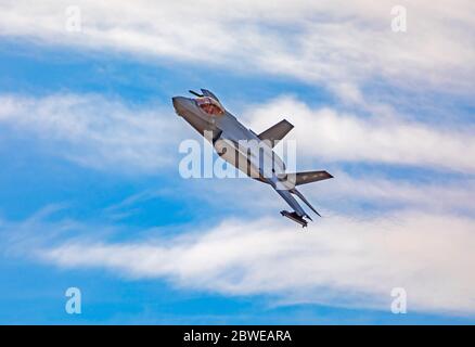 A Lockheed Martin F-35A Lightning II jet fighter banks left after taking off from Hill Air Force Base, Layton, Utah, USA. Stock Photo