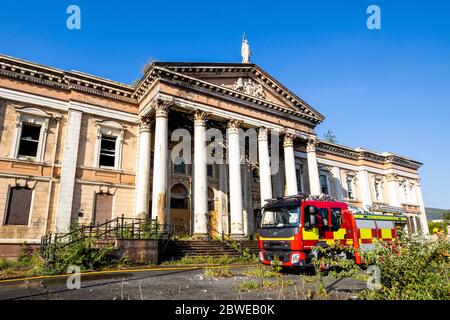 Northern Ireland Fire and Rescue Service firefighters tackling a large fire at Crumlin Road Courthouse in Belfast, Northern Ireland. Stock Photo