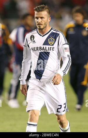 David Beckham wears pink football boots with his childrens names on them as he came on as a substitute in LA Galaxy's 1-0 defeat to Chivas USA, Carson, California. 19 May 2012 Stock Photo