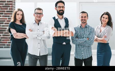 professional business team standing in spacious office Stock Photo