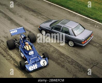 Jackie Stewart with some of his Grand Prix racing cars and a 1988 Ford Sierra Cosworth at Oulton Park 1988 Stock Photo