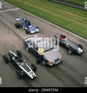 Jackie Stewart with some of his Grand Prix racing cars at Oulton Park 1988 Stock Photo