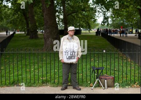 A speaker at Speakers' Corner which is situated near Marble Arch in the northeast corner of Hyde Park, London.  Speakers' Corner is a traditional open Stock Photo