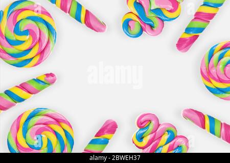 Flat lay composition with different candies on white background. Space for text Stock Photo