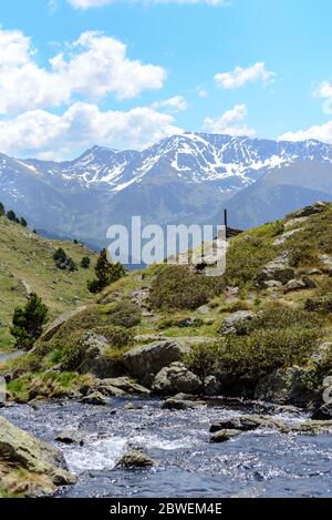 Beautiful view hiking in the Andorra Pyrenees Mountains in Ordino, near the Lakes of Tristaina.