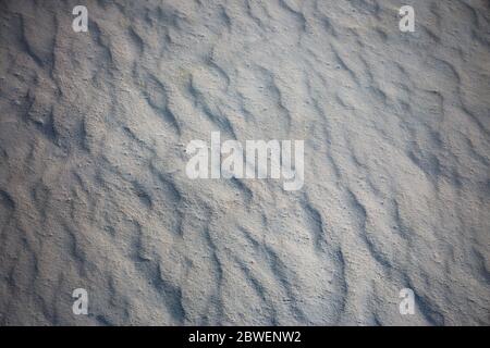 Close-up seamless white sand background beach. Stock Photo