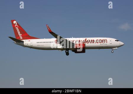 Turkish Corendon Airlines Boeing 737-800 with registration TC-TJI on short final for Amsterdam Airport Schiphol. Stock Photo
