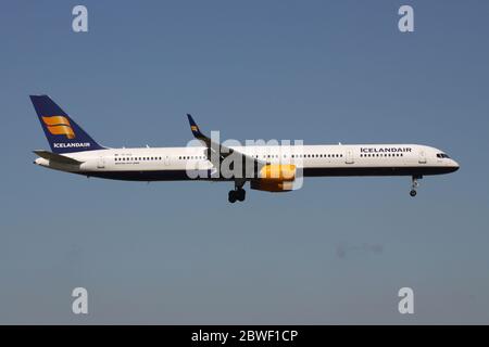 Icelandair Boeing 757-300 with registration TF-FIX rolling on taxiway V of Amsterdam Airport Schiphol.