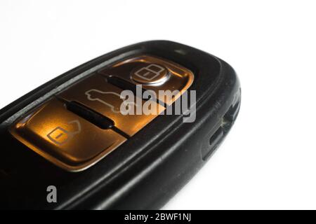 Viersen, Germany - June 1. 2020: Close up of isolated electronic car key, white background (focus on center) Stock Photo
