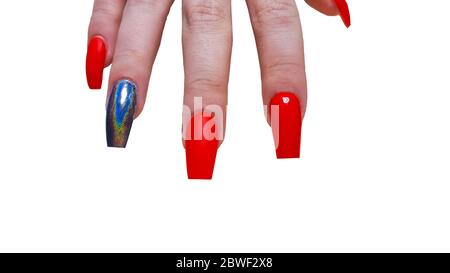 Manicure, nail extension, design with red varnish and mirror polish. View from above. Stock Photo
