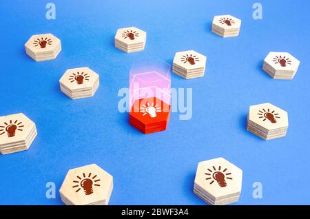 A red figure with a light bulb stands out among the rest. Choose best idea. Promising business startup. Most effective solution to task problem. Paten Stock Photo