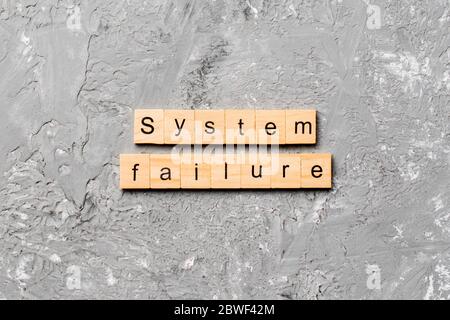 system failure word written on wood block. system failure text on table, concept. Stock Photo