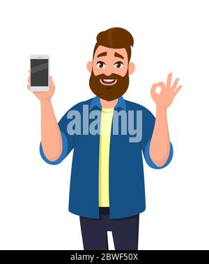 Happy young man showing smartphone and showing okay, OK or O sign. Mobile phone technology concept. Vector illustration in cartoon style. Stock Vector