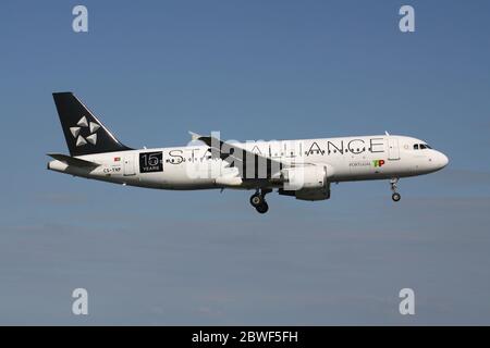 TAP Air Portugal Airbus A320-200 in special Star Alliance livery with registration CS-TNP on short final for Amsterdam Airport Schiphol. Stock Photo
