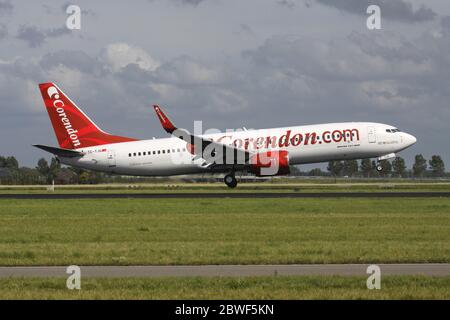 Turkish Corendon Airlines Boeing 737-800 with registration TC-TJG on short final for runway 18R (Polderbaan) of Amsterdam Airport Schiphol. Stock Photo