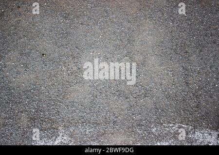 Black small road stone background, dark gravel pebbles stone texture seamless texture, granite, marble. For decoration work, pebbles spread all over t Stock Photo