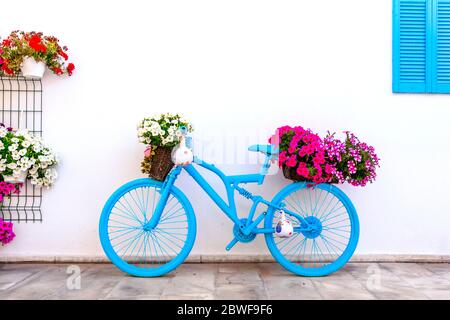 Charming bar decoration design in retro style with old bicycle and flowers Stock Photo