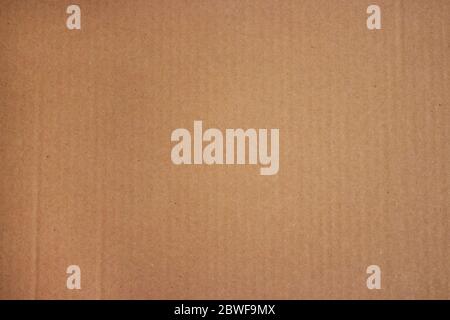 Brown corrugated cardboard texture useful as a background. Cardboard Texture. Cardboard Craft Paper Texture. Closeup of cardboard texture Stock Photo