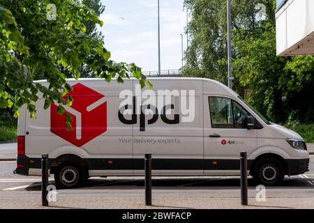 DPD Delivery van out and about making deliveries on a hot summer day during COVID-19 lockdown in Scotland Stock Photo