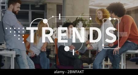 The word Trends written on blurred office background Stock Photo
