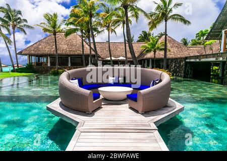 luxury 5 star resort territory with swimming pool and exotic bar - Constance Belle Mare Plage. Mauritius island. Pointe de flacq , Belle Mare. Februar Stock Photo